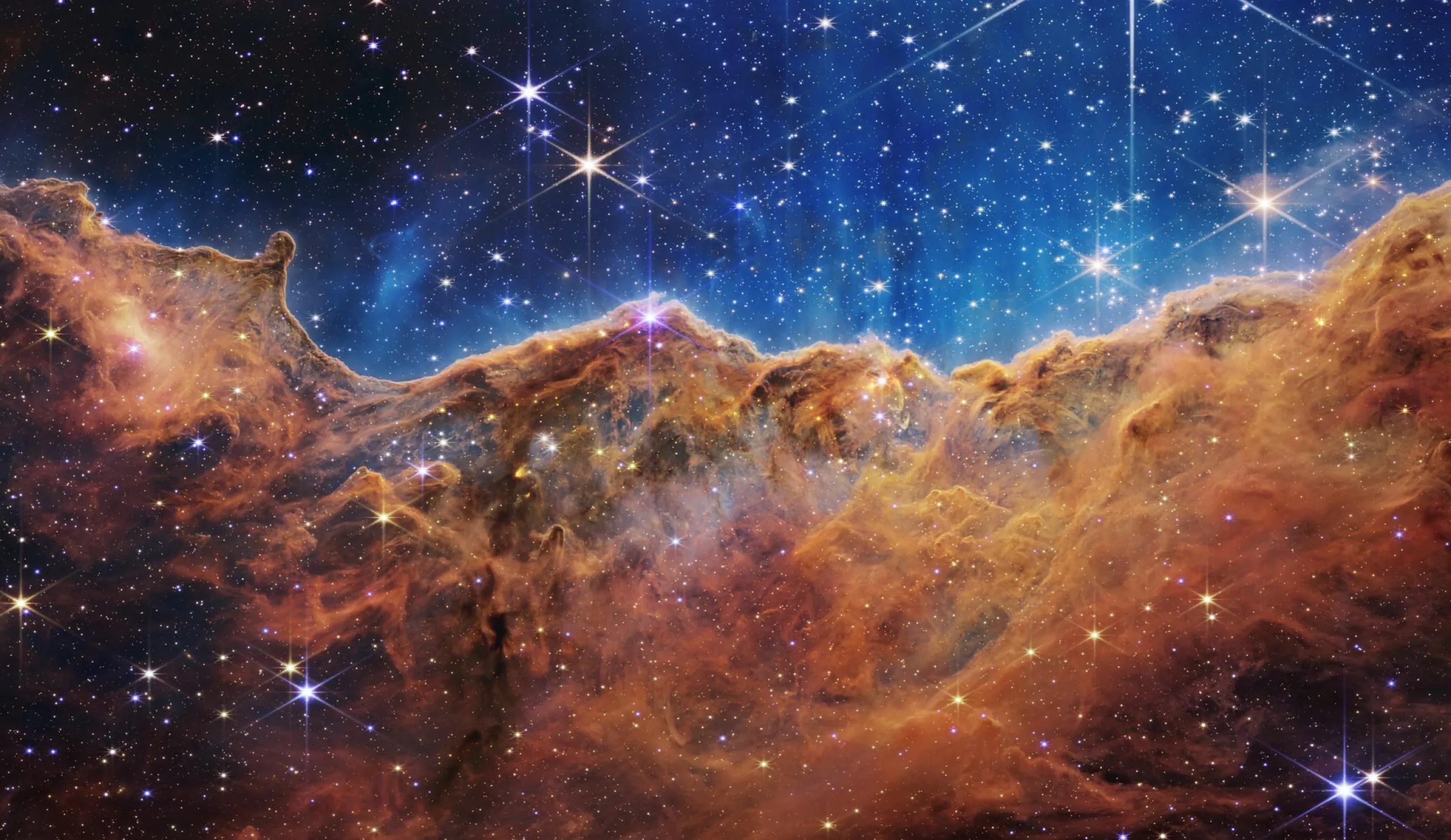 El telescopio Webb de la NASA revela los precipicios cósmicos y paisajes  resplandecientes de nacimiento estelar - NASA Ciencia