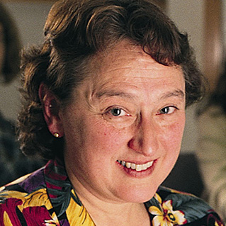 Headshot of Lynn Margulis wearing a flowered top.