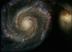 A look at the Whirlpool Galaxy from far away courtesy the Hubble Space Telescope.