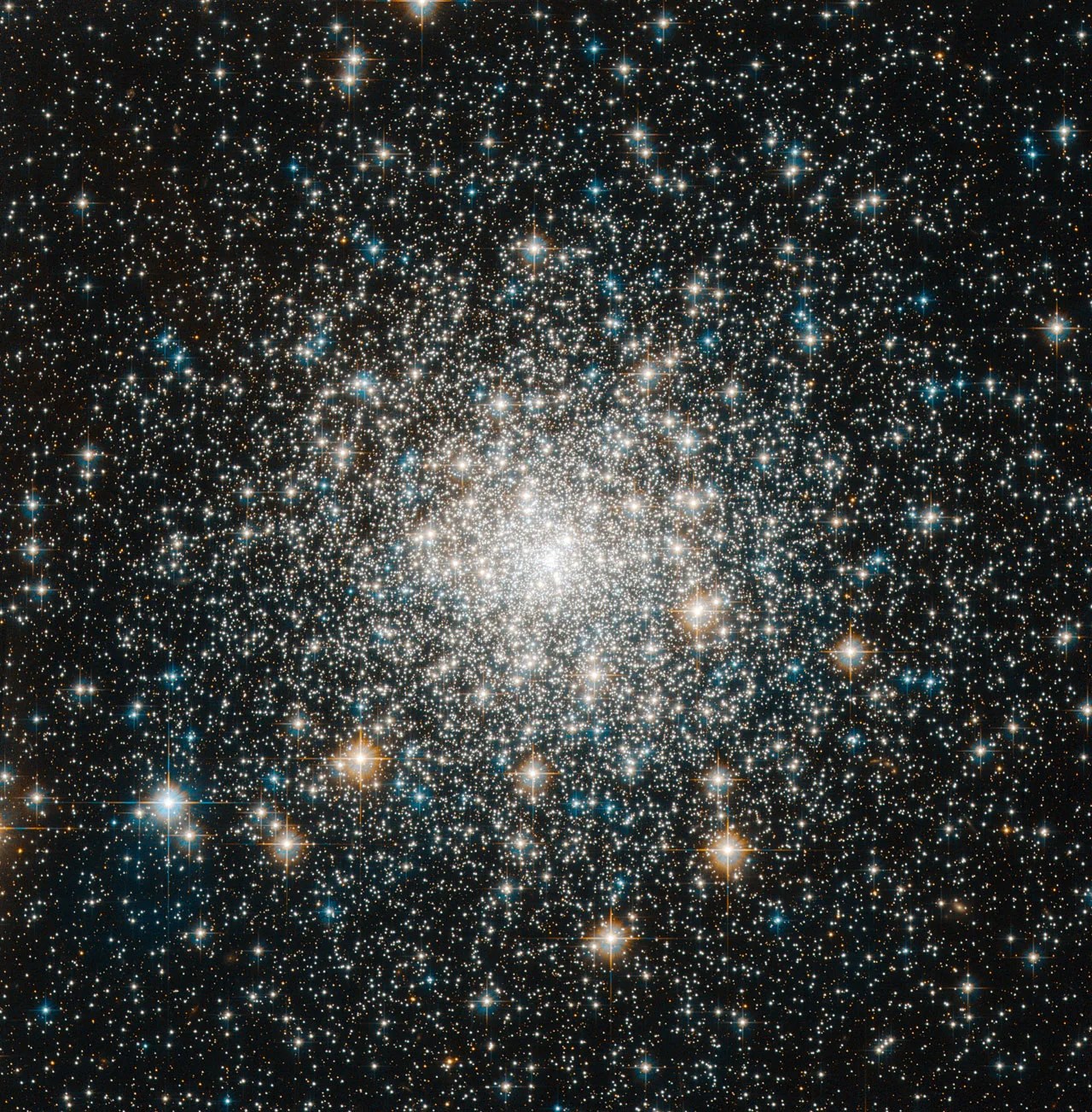 Hubble image of Messier 70 cluster is tightly packed toward the center