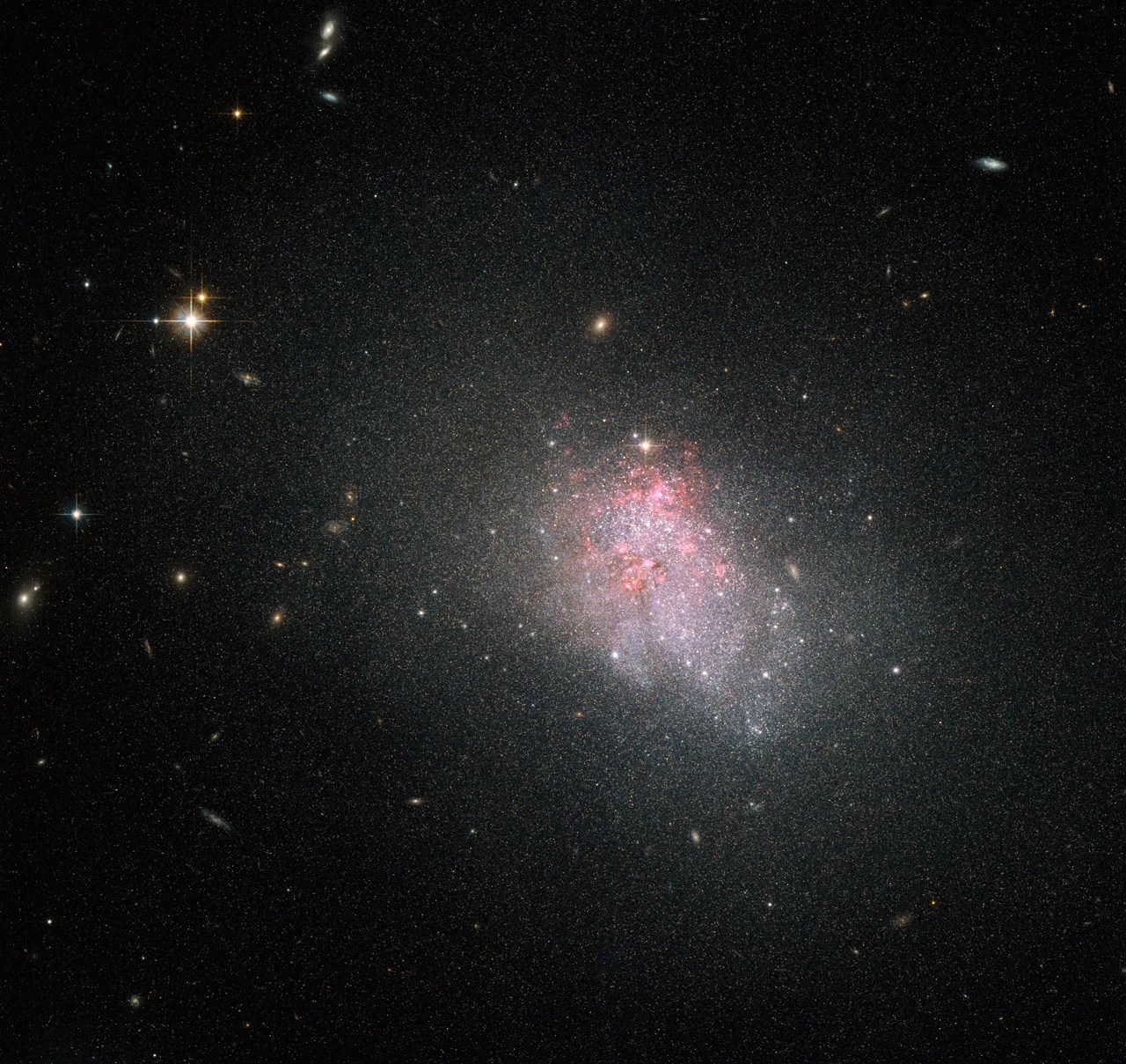 Hubble Sees Violent Star Formation Episodes in Dwarf Galaxies - NASA Science