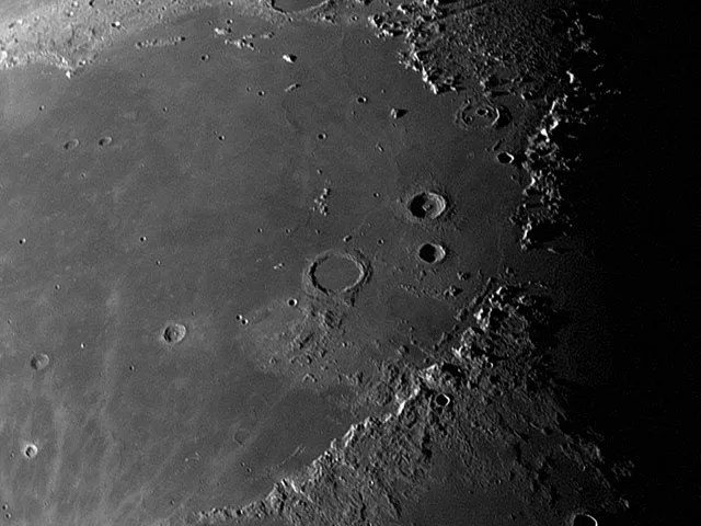 Detailed view of craters and a ridgeline on the Moon