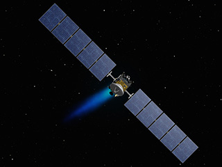Illustration of the Dawn spacecraft flying towards Ceres.