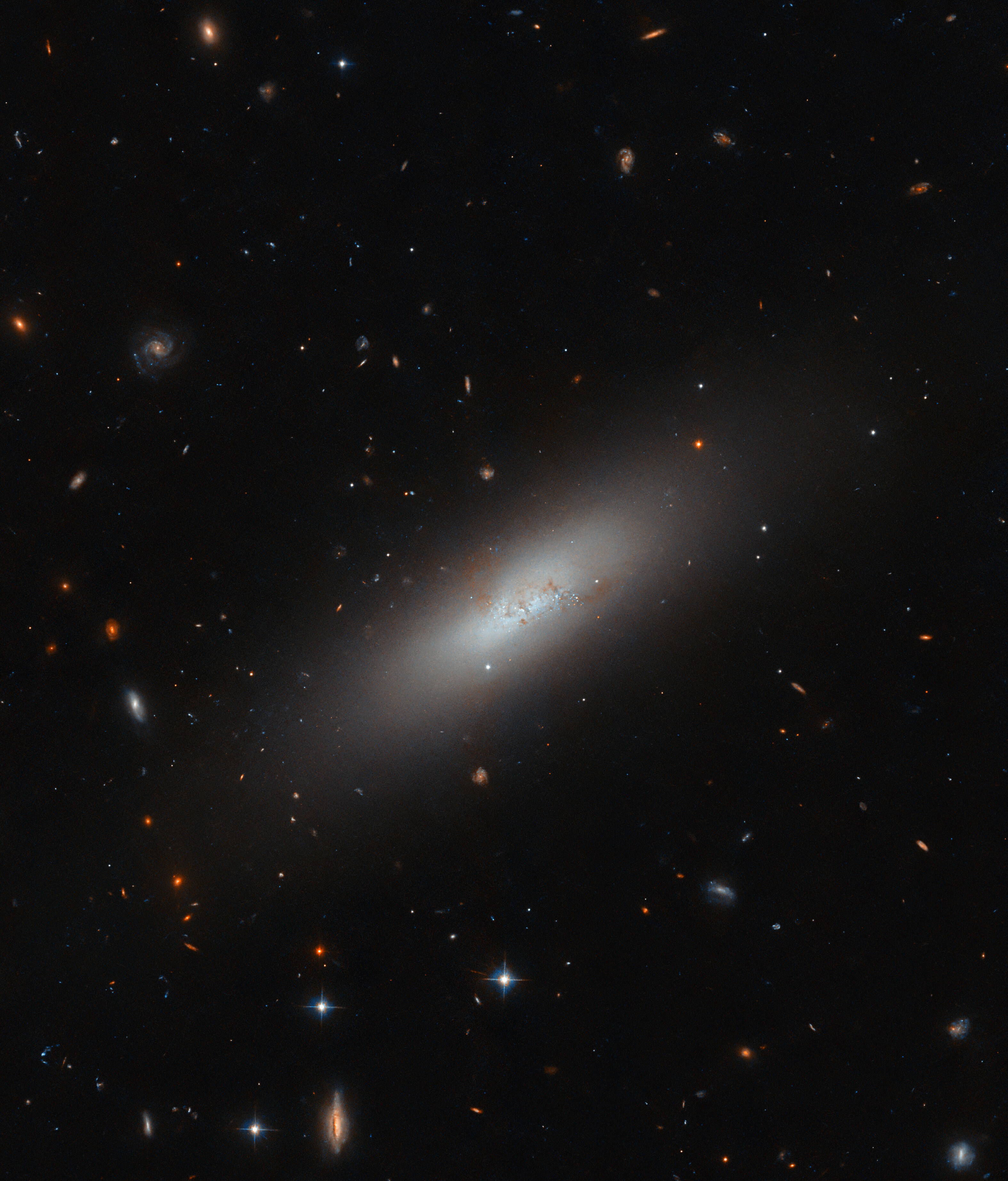 Hubble Spies a Diminutive Galaxy - ScienceX Innovations